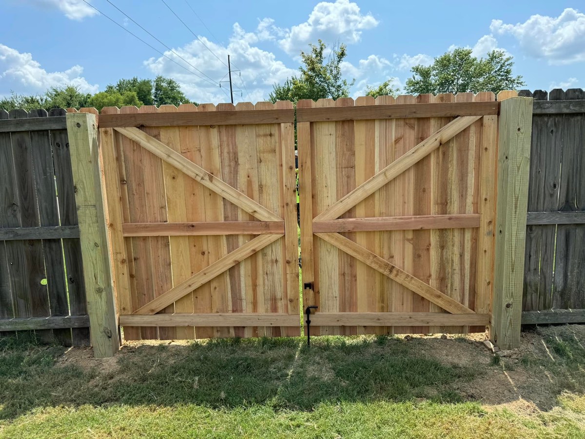 A finished wood double gate